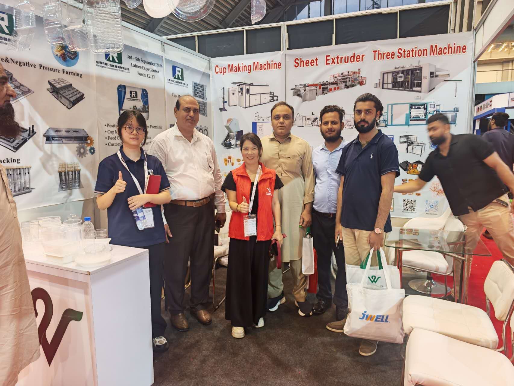 Cup making machine, sheet extruder and three station machine display boards with mould samples at the VihoX booth, 3P Plas Print Pack 2026 Lahore